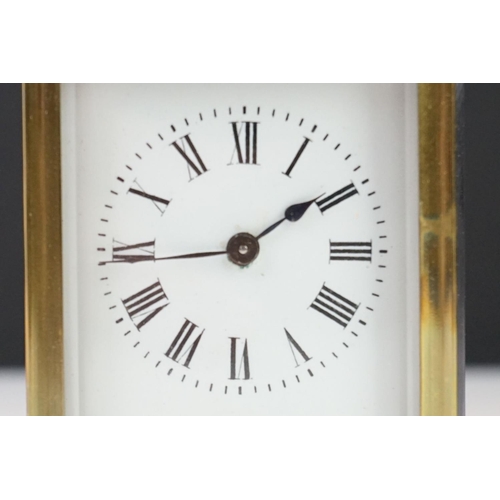 209 - A brass cased carriage clock with bevelled glass panels, the dial marked Hawley & Co of Regent St. L... 