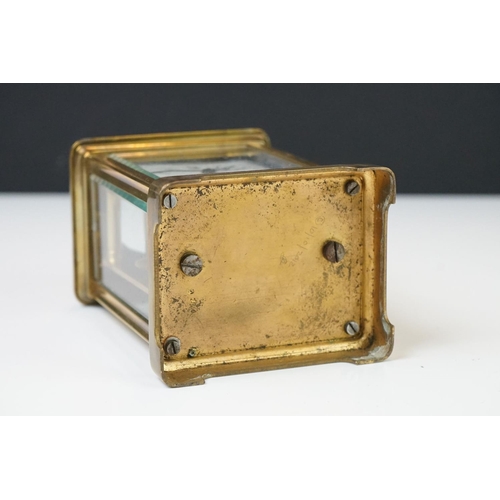 209 - A brass cased carriage clock with bevelled glass panels, the dial marked Hawley & Co of Regent St. L... 