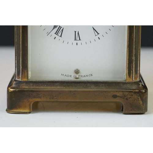 210 - A Bayard 8 Day French carriage clock in brass case with bevelled glass panels.