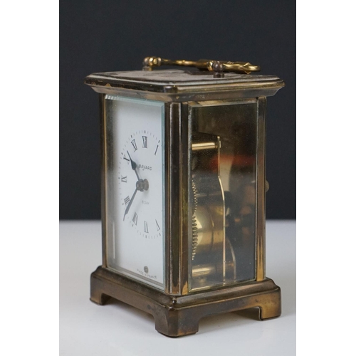 210 - A Bayard 8 Day French carriage clock in brass case with bevelled glass panels.