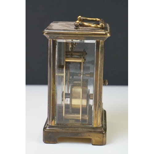 210 - A Bayard 8 Day French carriage clock in brass case with bevelled glass panels.