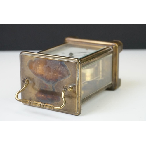 210 - A Bayard 8 Day French carriage clock in brass case with bevelled glass panels.