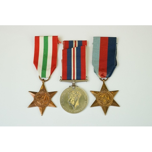 211 - A British full size World War Two medal trio to include the 1939-45 British war medal, the 1939-45 s... 