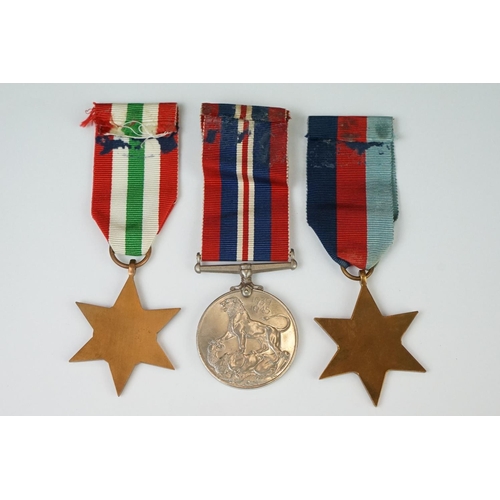 211 - A British full size World War Two medal trio to include the 1939-45 British war medal, the 1939-45 s... 