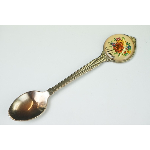 212 - A small collection of commemorative souvenir spoons together with a hallmarked silver and mother of ... 