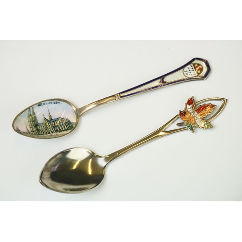 212 - A small collection of commemorative souvenir spoons together with a hallmarked silver and mother of ... 