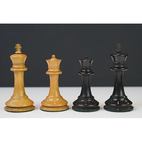 217 - A vintage Staunton chess set, the kings both marked Jaques London, complete with original box and in... 