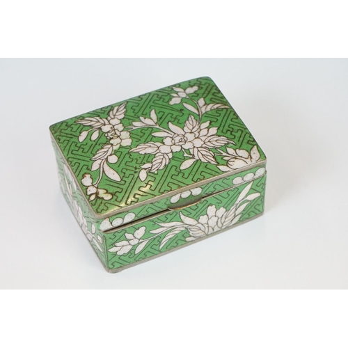 218 - A collection of three oriental cloisonné enamel trinket boxes together with a similar lidded jar.