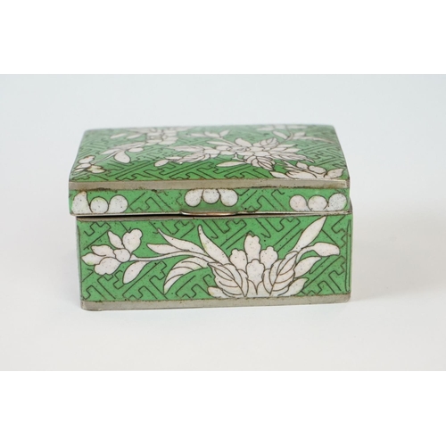 218 - A collection of three oriental cloisonné enamel trinket boxes together with a similar lidded jar.