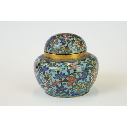 218 - A collection of three oriental cloisonné enamel trinket boxes together with a similar lidded jar.