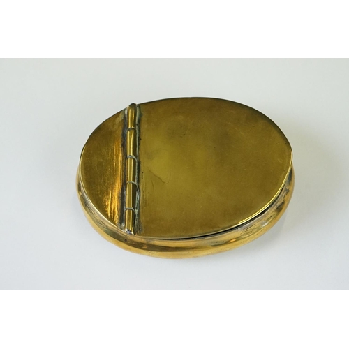 219 - A collection of five antique brass snuff or tobacco boxes to include a 19th century example, one ins... 