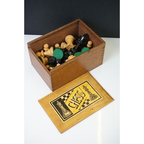 221 - Two vintage boxwood chess sets together with wooden chess board and two associated brushes.