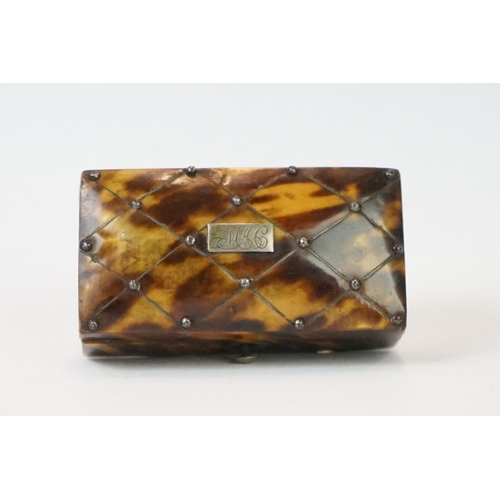 275 - An antique faux tortoiseshell trinket box with central cartouche to the hinged lid and turned bone f... 