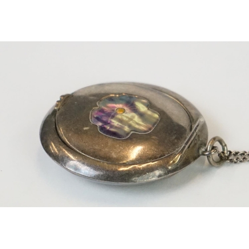 278A - A fully hallmarked sterling silver pill box on a white metal necklace, assay marked for Chester and ... 