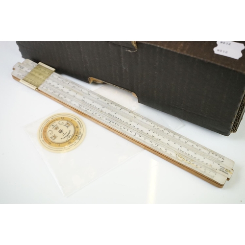 291 - Pocket Barometer by Negretti and Zambra with a collection of slide rule scales, drawing instruments,... 