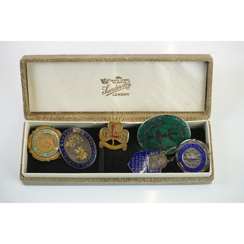 294 - A box of mixed collectables to include an ostrich egg, Parker pen, coins and badges.