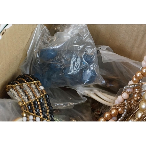 299 - Two boxes of costume jewellery, to include bracelets, necklaces, bangles etc