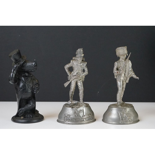 300 - A group of mixed collectables to include military figures and a miniature miners lamp.