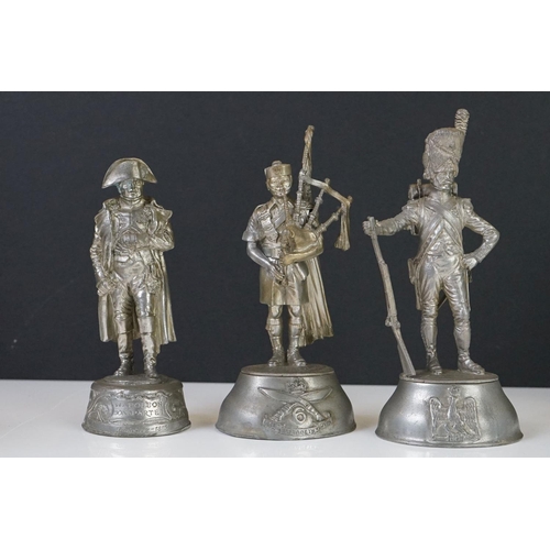 300 - A group of mixed collectables to include military figures and a miniature miners lamp.