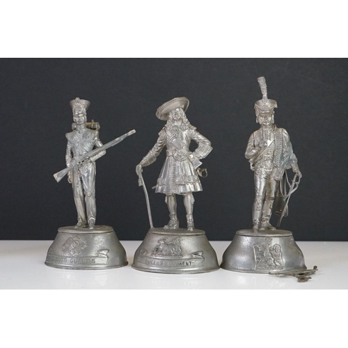 300 - A group of mixed collectables to include military figures and a miniature miners lamp.