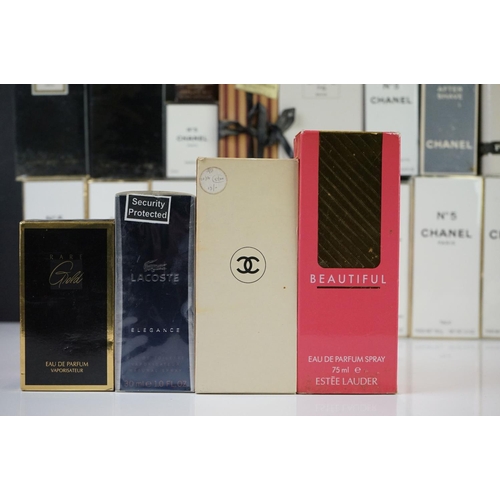 303 - A large collection of mixed scents & perfumes to include Chanel, Lacoste and Christian D'ior example... 