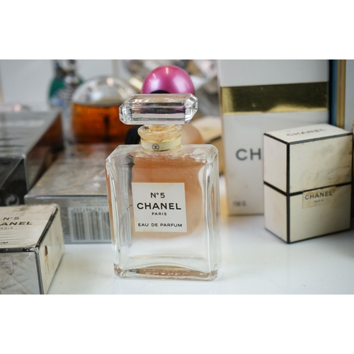 303 - A large collection of mixed scents & perfumes to include Chanel, Lacoste and Christian D'ior example... 