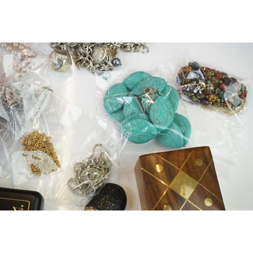 304 - Box of mixed collectables to include silver plated cutlery, trinket boxes, costume jewellery, milita... 