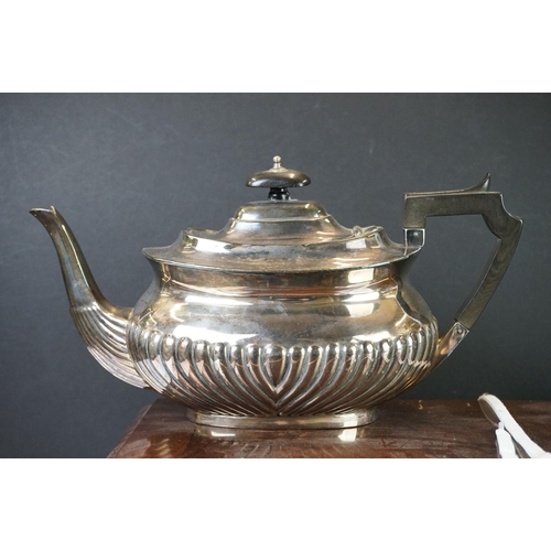 308 - A canteen of silver plated cutlery together with a silver plated teapot and coffee pot and a hallmar... 