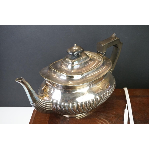 308 - A canteen of silver plated cutlery together with a silver plated teapot and coffee pot and a hallmar... 