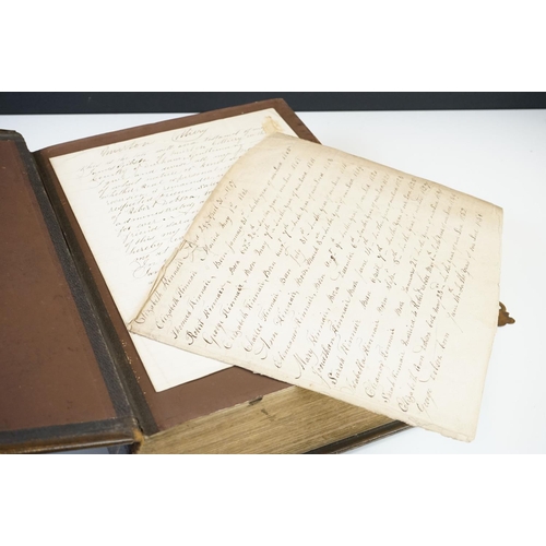 311 - A large antique 19th century family bible with brass fastenings.