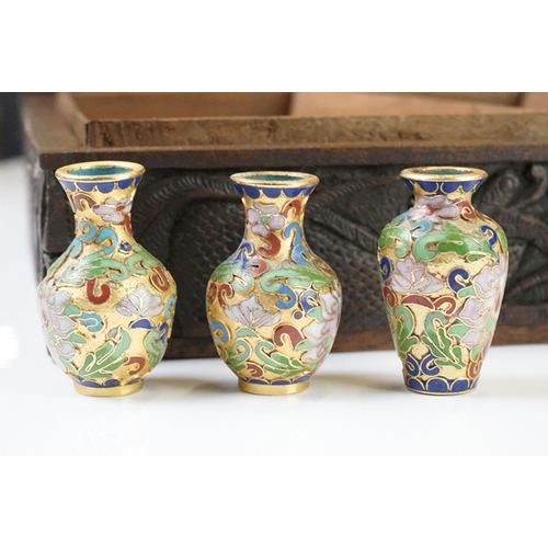 318 - A small collection of miniature continental and oriental ceramics and cloisonné vases contained with... 