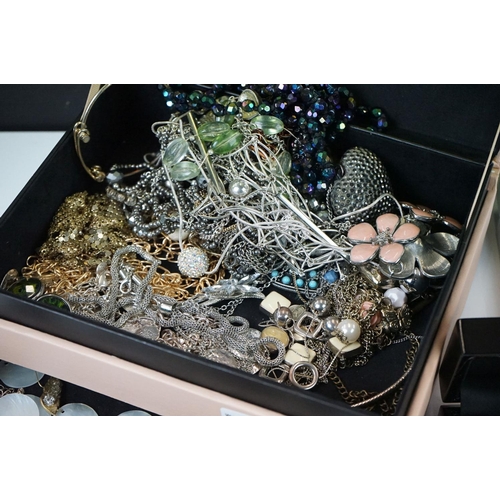 334 - A collection of mainly contemporary costume jewellery to include some silver examples.