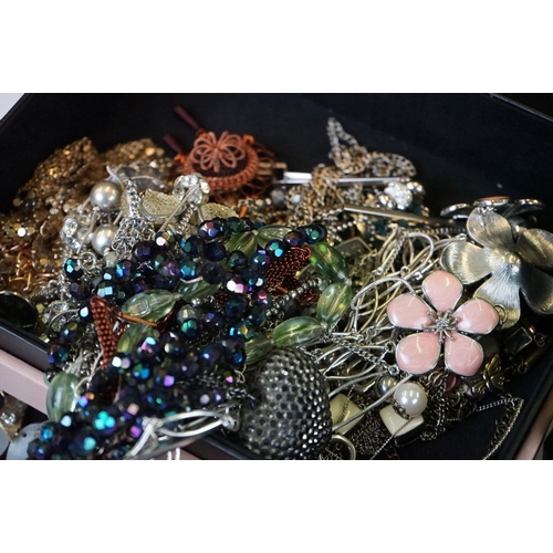 334 - A collection of mainly contemporary costume jewellery to include some silver examples.