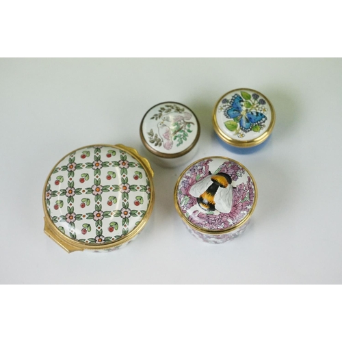 338 - A collection of approx fourteen enamel trinket boxes to include Halcyon Days examples.