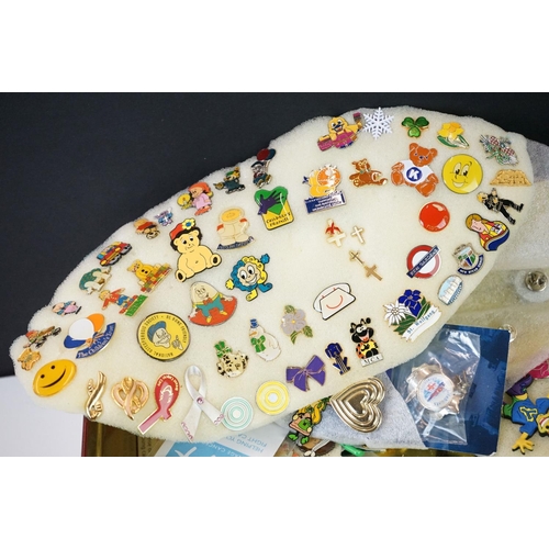 341 - A group of mixed collectables to include a large quantity of mixed pin badges and a small group of c... 