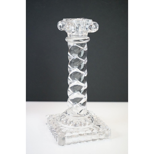 70 - Set of Four Baccarat Moulded Clear Glass Candlesticks in the form of Corinthian Columns, 18.5cm high... 