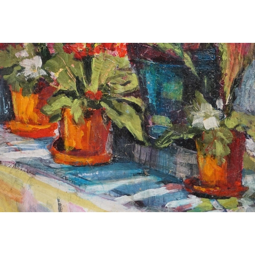 476 - 20th century oils on board, a still life of an array of potted plants on a table with drape, approx.... 