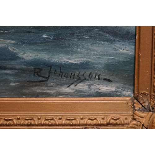 512 - R Johansson oil on canvas seascape, sailboat off a rugged coastline, in gilt swept frame, approx. 34... 