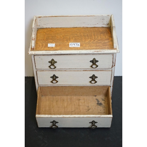 597A - Victorian oak tabletop painted three drawer chest, 32cm wide x 35cm high