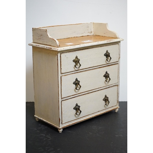 597A - Victorian oak tabletop painted three drawer chest, 32cm wide x 35cm high