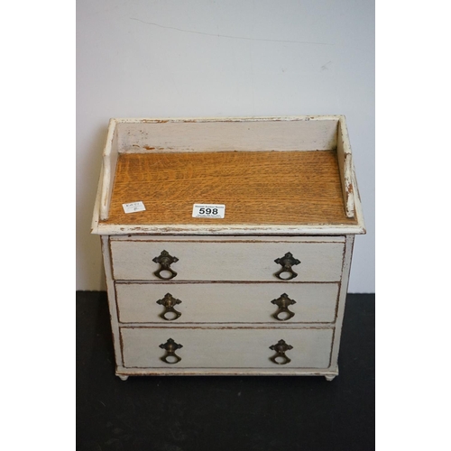 598 - Victorian oak tabletop painted three drawer chest, 32cm wide x 35cm high