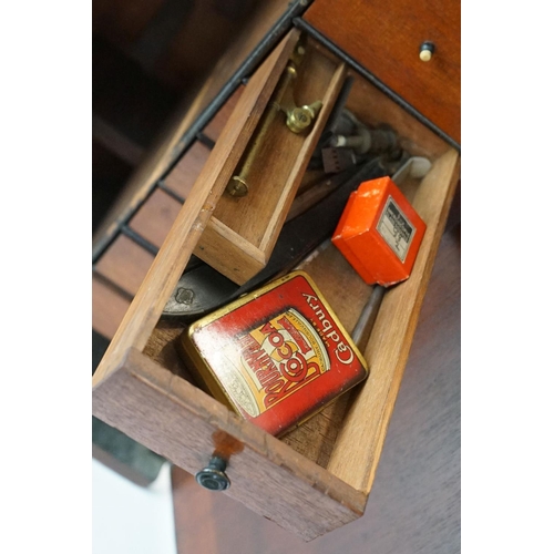 186 - A mahogany cased microscope by J.B. Dancer of Manchester with extra lenses, slides...etc.