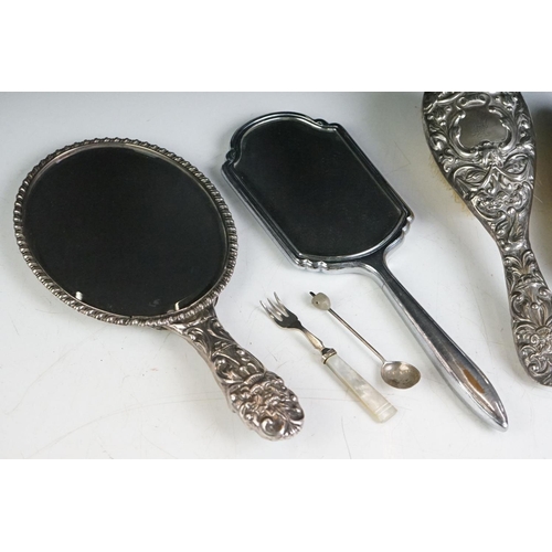 310 - A box of mixed collectables to include dressing table brushes and mirrors to include silver example,... 