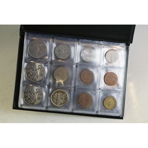 345 - A small collection of mixed coins and banknotes to include commemorative crowns.