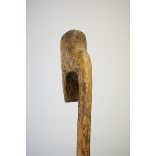 392 - A vintage hand carved walking stick with figural head handle.