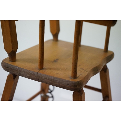 552 - Child's Wheelback Chair and a Doll's High Chair