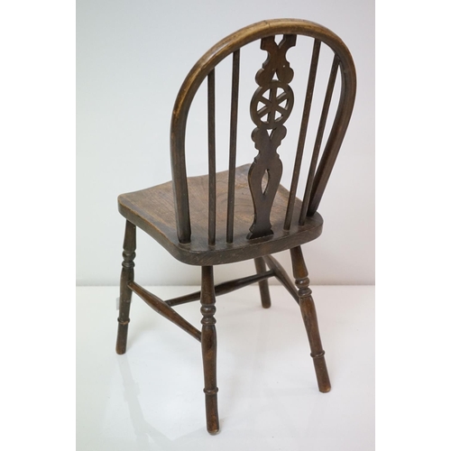 552 - Child's Wheelback Chair and a Doll's High Chair