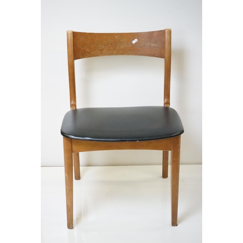 555 - Set of Four Mid century Retro Teak Dining Chairs with black vinyl seats