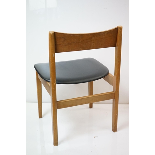 555 - Set of Four Mid century Retro Teak Dining Chairs with black vinyl seats