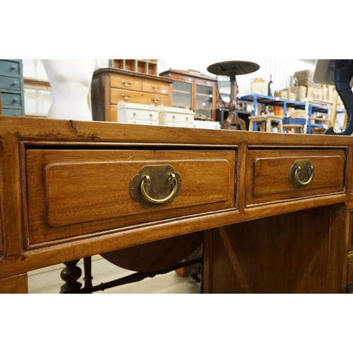 576 - Chinese Hardwood Twin Pedestal Desk of concave form comprising an arrangement of six drawers and two... 